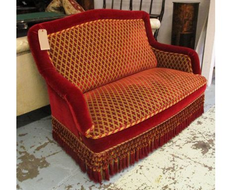 NAPOLEON III SOFA, with patterned red plush upholstery, bullion fringe, 127cm W x 76cm D x 90cm H max.