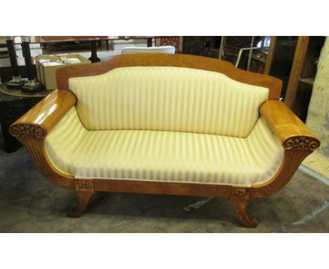 BIEDERMEIER SOFA, satin birch with carved cornucopia arm supports and gold striped upholstery on short swept feet, 187cm L x 