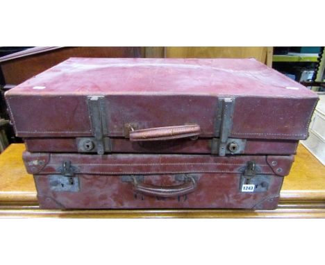 A vintage stitched brown leather suitcase with reinforced corners with brass fittings together with one other, together with 