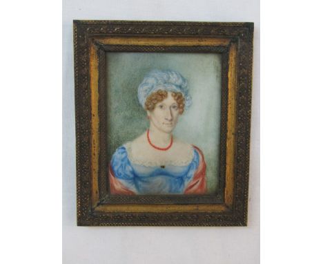 Early 19th century British school - Half length portrait of a lady in blue dress and coral necklace, miniature watercolour on