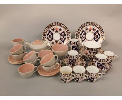 A collection of Sutherland China tea wares in the imari manner comprising a pair of cake plates, milk jug, sugar or slop bowl