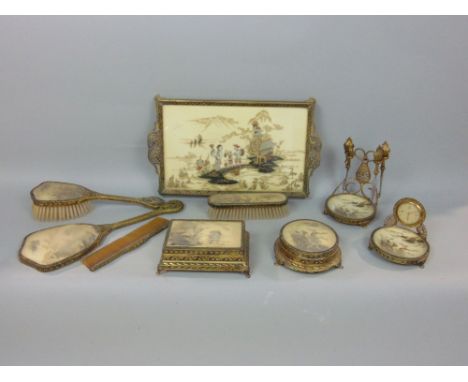 Interesting 1930s chinoiserie dressing set, with gilt metal frame and typical Chinese icons of figures, to include brushes, m