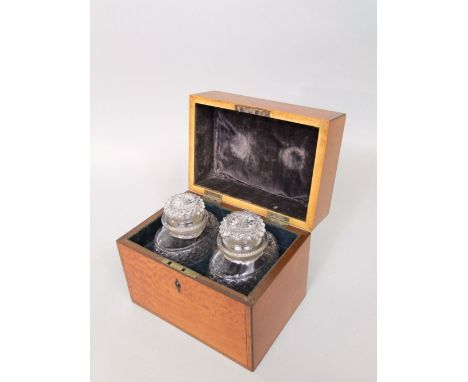 A good 19th century satinwood and boxwood inlaid caddy with rosewood cross banding, the hinged lid enclosing a baise lined in