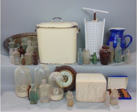 A wooden box containing a large collection of miscellaneous items to include a collection of antique advertising and other sm