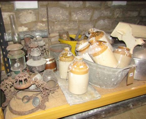 A quantity of miscellaneous items cleared from a local farmhouse to include various storm lanterns and hanging light fittings