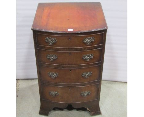 A small Georgian style walnut veneered bow fronted bedroom chest of four long oak lined graduated drawers with shaped apron o