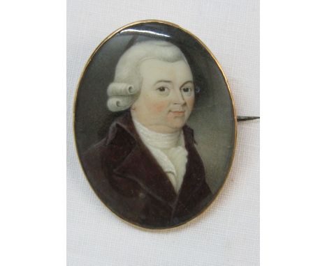 18th century - Miniature bust length portrait of oval form of a gentleman in brown coat and white cravat, watercolour and bod