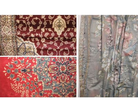 Large eastern wool carpet decorated with various floral details upon a red ground, together with a similar maroon example, th