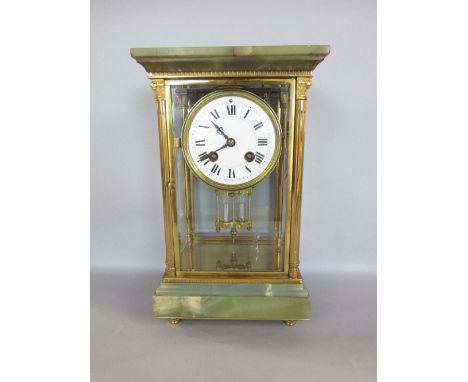 Good French polished brass and onyx four glass mantle clock, the case fitted with Corinthian columns around a two train ename