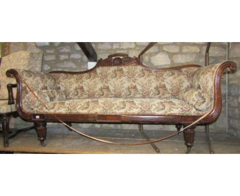 A late Regency/William IV double scroll arm sofa, the carved and moulded showwood frame with shell beaded and further detail 