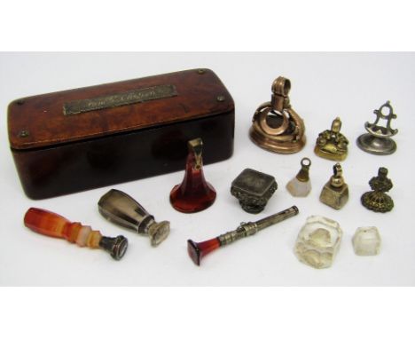 A Georgian burr wood snuff box containing a collection of good antique intaglio seals to include 'Dinna Forget' with thistle 