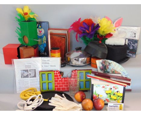 A large mixed collection of magicians and performers props
