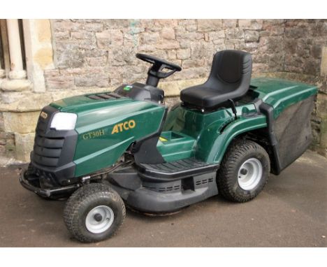 An Atco model GT30H tractor lawn mower and grass collection box with Briggs &amp; Stratton power built 344cc engine