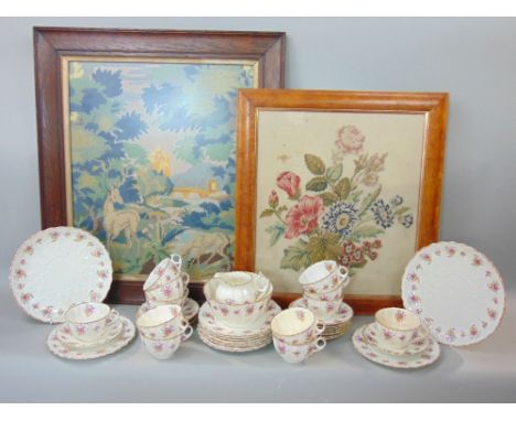 A collection of 19th century floral tea wares including milk jug, slop bowl, pair of cake plates, twelve cups, twelve saucers