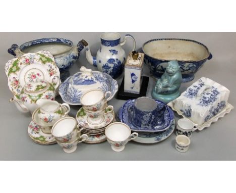A collection of 19th century blue and white printed ceramics including a tureen base with lion and pyramid detail and lion ma