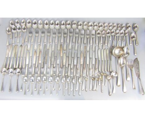 Large and comprehensive suite of Victorian silver beaded flatware comprising eighteen table spoons, twelve table forks, eight