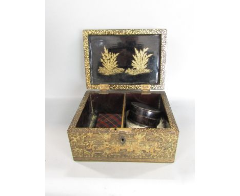 Late 19th century chinoiserie lacquered tea caddy, with typical gilt decoration and characters within a pagoda garden landsca