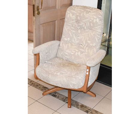 Light Ercol c.1990's Modern Upholstered Armchair, on swivel base and recliner