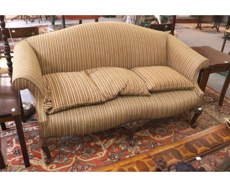 A 19th Century Hump Back Scroll End Sofa, on carved supports with striped upholstery, 175cm by 90cm by 90cm