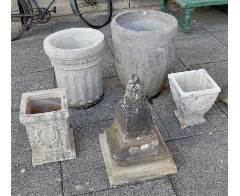 A Composition Garden Planter, 60cm high, another with fluted body, 51cm high, two small square planters, two sandstone caps a