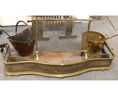 A Serpentine Fronted Pierced Brass Fender, 128cm by 46cm, a smaller steel example, a spark guard, a copper coal skuttle, a br