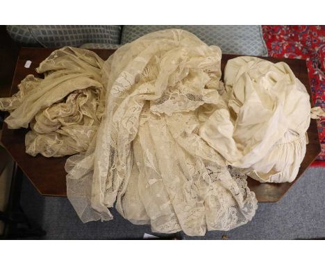 Assorted Early 20th Century Costume and Lace comprising two white cotton bonnets, a cream silk baby dress, young girls cream 