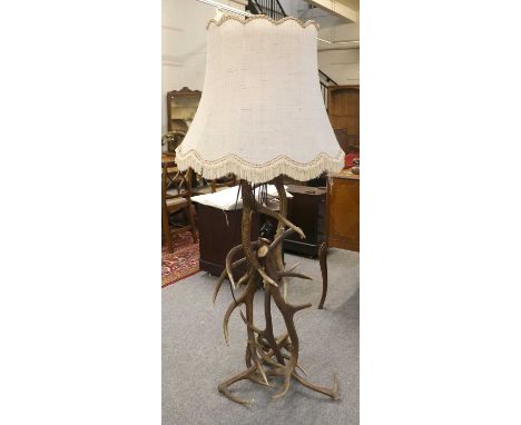 Antler Furniture: An Austro-German Antler Mounted Standard Lamp, the supporting column constructed from multiple adult Red de
