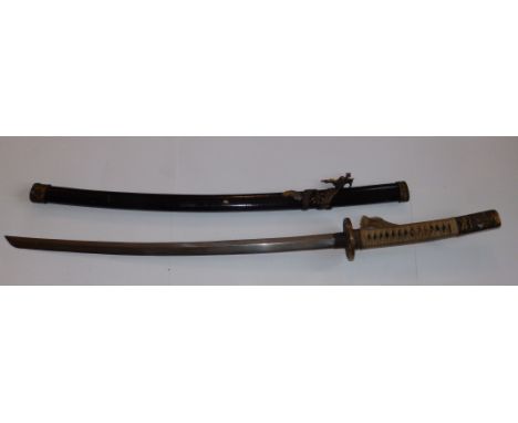 A reproduction Japanese Samurai sword in scabbard