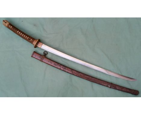 A Japanese WWII officer's katana, two peg holes to tang, the blade 26,75” in painted metal scabbard