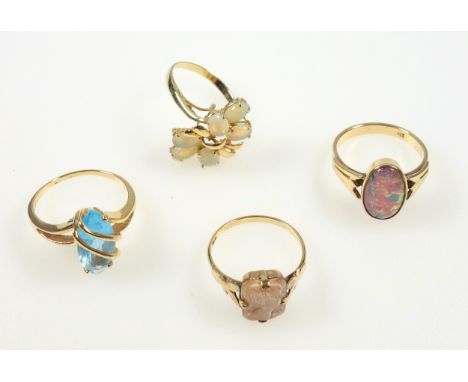 Yellow metal opal set floral ring stamped 585, topaz ring stamped 14K and 2 other rings, gross 9.5grs (4) 