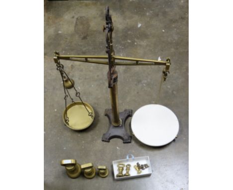 Set of Victorian iron and brass scales by Day &amp; Millward Ltd, Patentees, to weigh up to 10lbs, with a pierced beam, circu