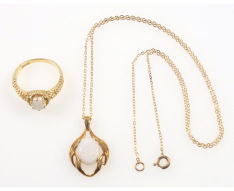 Yellow metal ring set opal, with pierced shoulders, stamped 14K, gross 2.3grs, and a 9ct gold opal pendant on a fine chain st