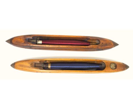 Two vintage wooden bobbin shuttles, one stamped Bancroft Shuttles Ltd, Blackburn, the other I Dawson, London ? both with mate