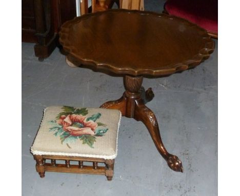 A REPRODUCTION MAHOGANY PIE-CRUST TILT TOP TRIPOD COFFEE TABLE, ALSO A  BEECHWOOD FOOTSTOOL WITH FLORAL TAPESTRY TOP 