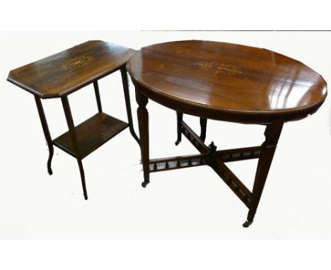 A VICTORIAN MAHOGANY OVAL CENTRE TABLE, WITH DECORATIVE INLAY, ON FOUR FLUTED SUPPORTS WITH 'X' GALLERIED STRETCHER, ON CASTO