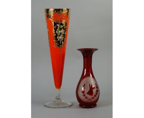 AUSTRIAN RUBY STAINED GLASS VASE, of footed ovoid form with tall, waisted neck, decorated with two frosted panel depicting st