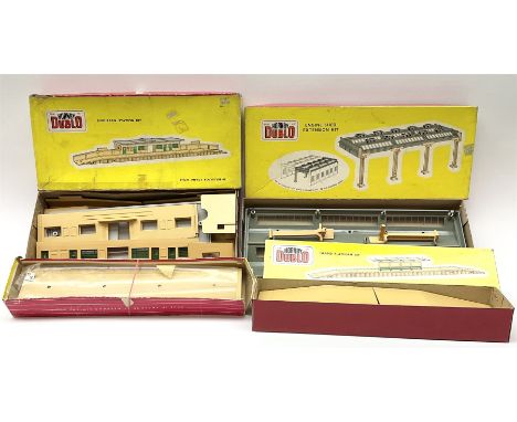 Hornby Dublo - 5006 Engine Shed Extension Kit; 5085 Suburban Station Kit; and 5030 Island Platform Kit; all in pictorial boxe