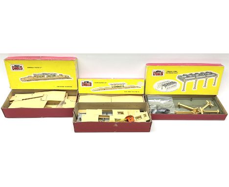 Hornby Dublo - 5006 Engine Shed Extension Kit; 5085 Suburban Station Kit with instructions; and 5030 Island Platform Kit; all