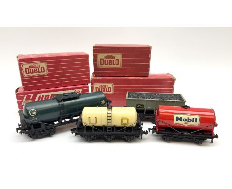Hornby Dublo - 4685 Caustic Liquor Bogey wagon; 4644 21-Ton Hopper Wagon; 4657 'United Dairies' Milk Tank Wagon; and 4677 Tan