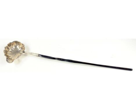 A SILVER PUNCH LADLE WITH TWISTED BALEEN HANDLE