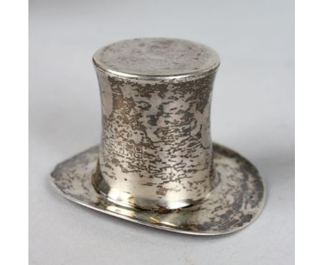 A CARTIER SILVER TOP HAT.  2ins high.