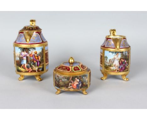 A VIENNA CIRCULAR THREE PIECE TEA SET with light blue ground, gilt decoration and classical panels, comprising tea or coffee 