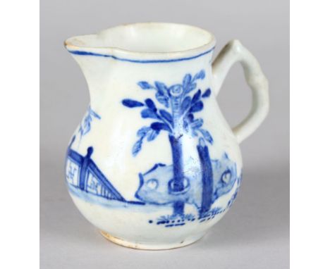 A WORCESTER JUG, "CORMORANT AND FENCE". 3ins high.