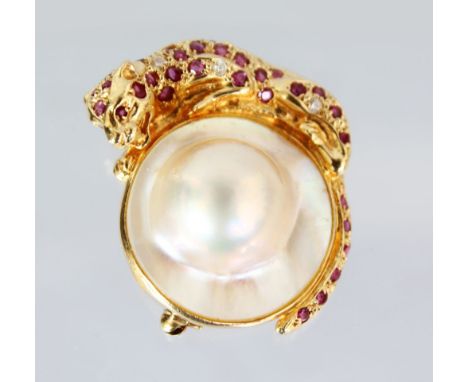 AN 18CT YELLOW GOLD, RUBY, DIAMOND AND MOTHER-OF-PEARL PANTHER BROOCH.