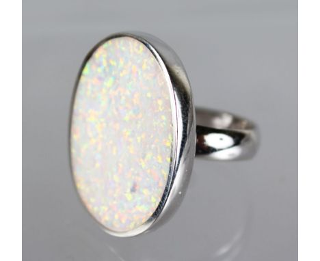 A SILVER OPAL RING.