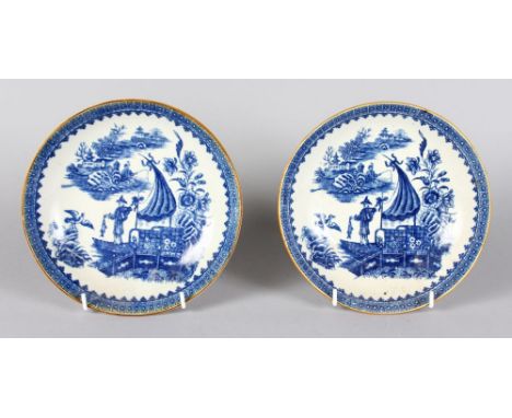 A PAIR OF WORCESTER CIRCULAR DISHES, "THE FISHERMAN AND THE CORMORANT". 7.5ins diameter.