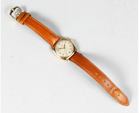A GENTLEMAN'S 9CT YELLOW GOLD WRISTWATCH with leather strap by J. W. BENSON LTD, No. 12102. Engraved J.A.N.S.S.-K. 12th Decem