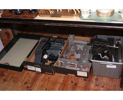 Three boxes of railway accessories including controllers, track, buildings, Bachmann display case, etc.