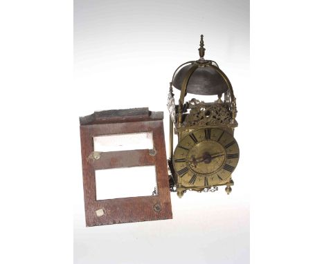 Antique brass lantern clock with Roman numeral dial marked Thomas Greene Cuckfeild Fecit together with a wooden bracket.