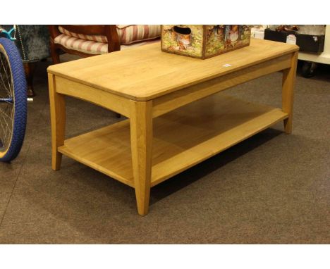 Ercol Artisan rectangular two tier coffee table, 43cm by 100.5cm by 50.5cm.